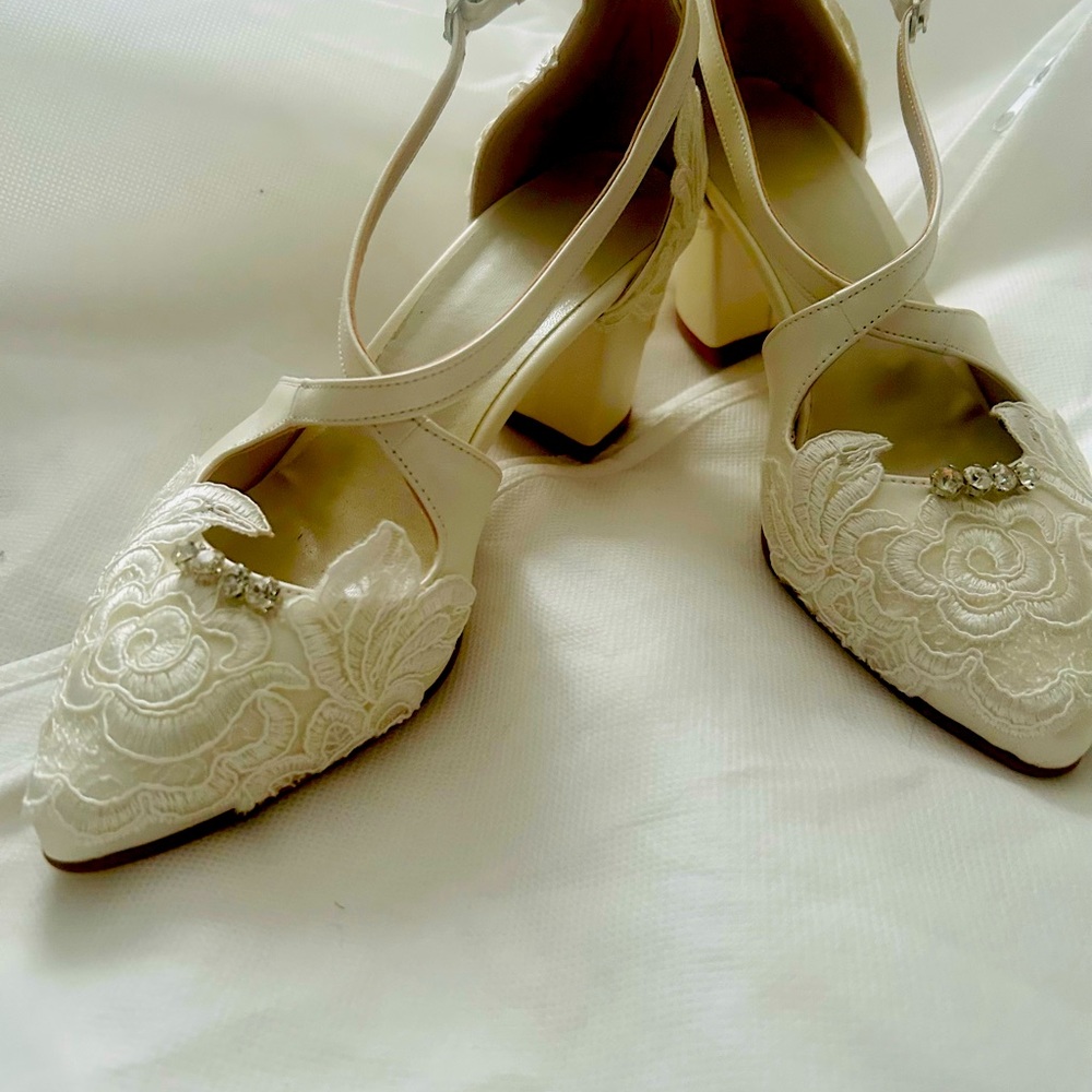 Ivory Bridal Shoes size 36/6 with a 3”heel lace up the back with straps across